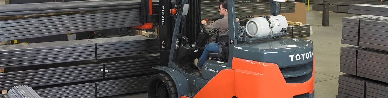 Toyota propane forklift handling material in an industrial setting